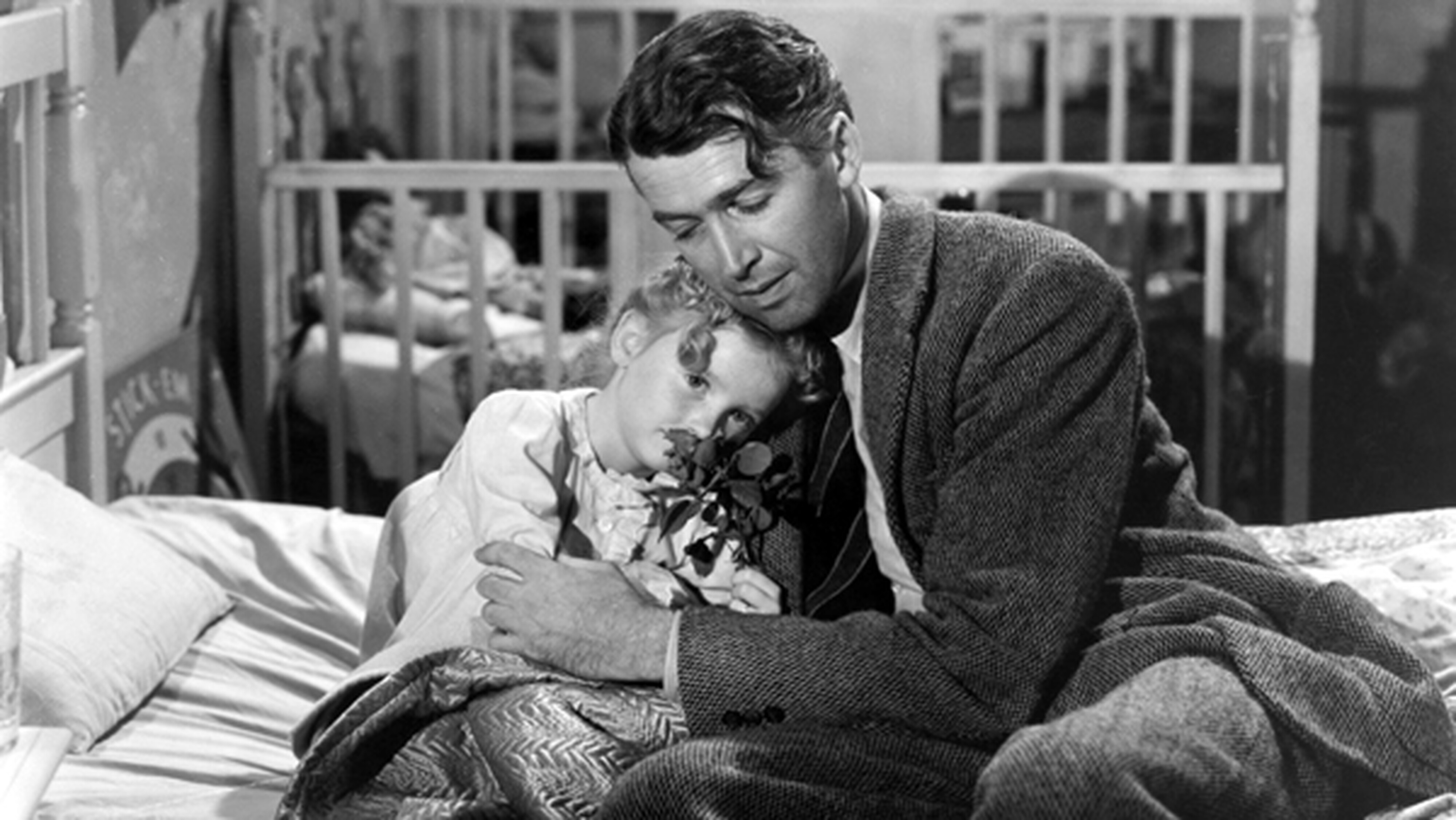 Каролин Граймс, в роли Зузу и Джеймс Стюарт, в роли Джордж Бейли в фильме «Это замечательная жизнь» © 1946 